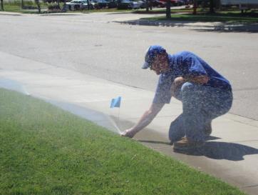 Petter, one of our Kitchener irrigation repair techs is making some adjustements